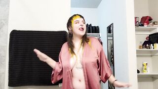 Goth Girl gives Playful Strip Tease Dance in Silk Robe