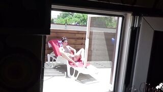 Spy my hot neighbor woman while she tan her beautiful body.