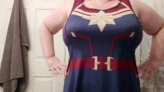 Caressing my curves in my new Captain Marvel dress!