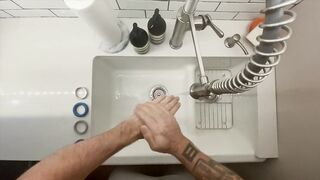 In-Home Massage Therapist Austin Wolf Washes Hands