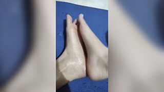 Soles Rubbed together with Lotion