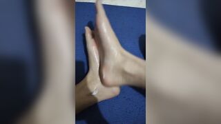 Soles Rubbed together with Lotion