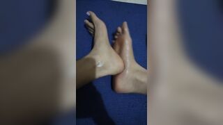 Soles Rubbed together with Lotion