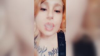 Girl with Fat Lips Smokes a Cigar