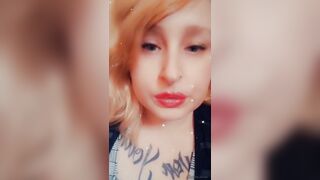 Girl with Fat Lips Smokes a Cigar