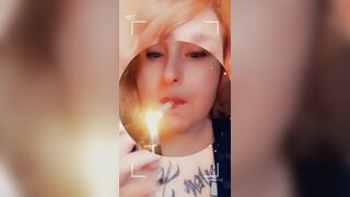 Girl with Fat Lips Smokes a Cigar