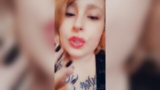 Girl with Fat Lips Smokes a Cigar