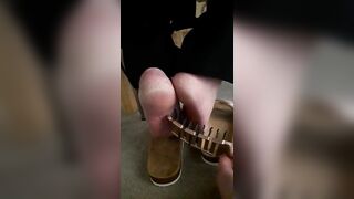 Mature feet tickle under chair 2