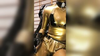 Gold rubber doll