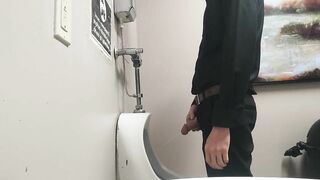 Pissing at public urinal and jerk off before someone comes in