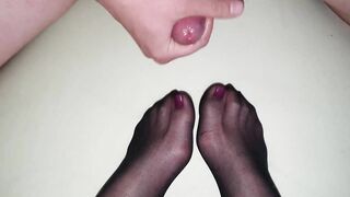 Big cumshot on Wife's nylon feet