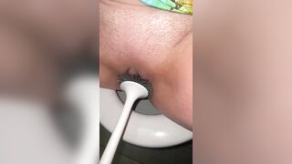 Licking public toilets in the hotel and playing with toilet brush