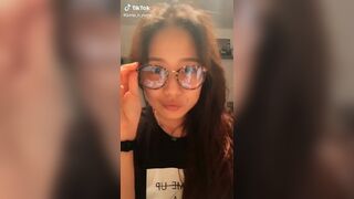 Tik Tok Female: Cute asian american nerd dancing.