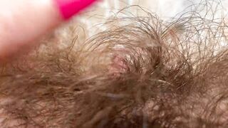 Big clit super hairy pussy in extreme close up