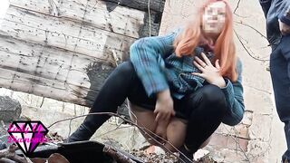 Desperate Redhead peeing in the forest ruins.