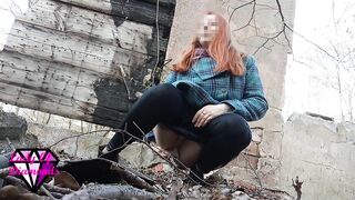 Desperate Redhead peeing in the forest ruins.