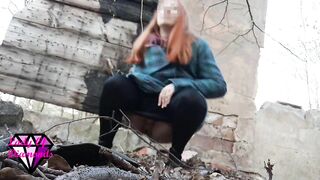 Desperate Redhead peeing in the forest ruins.