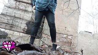 Desperate Redhead peeing in the forest ruins.