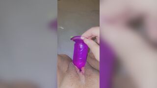 Putting my purple dildo deep inside my hungry pussy