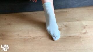 Sexy girl tries her new pretty white sport socks