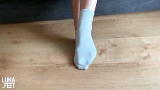 Sexy girl tries her new pretty white sport socks