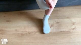 Sexy girl tries her new pretty white sport socks