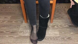 Student girl show nylon socks, boots and foot after study