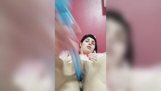 brunette punching toy in pussy