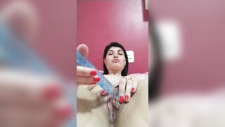 brunette punching toy in pussy