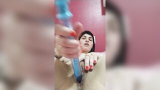 brunette punching toy in pussy