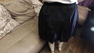 Schoolgirl in shackles and handcuffs, white knee socks, uniform