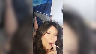 55 year old amateur MILF smokes & dangles cigarette in red lipstick w/ footplay