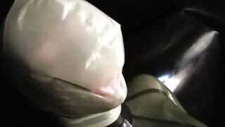 Hot milf with big tits full encased in rubber has fun with latex hood and breath play game - Part 1