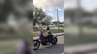 Bonnie public flashing while riding motorcycle