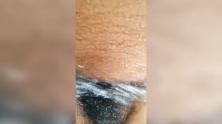 Ebony milf masturbates and reaches for a squirt and then showers outdoors