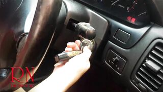 A Lady Masturbates in a Car in a Parking Lot Teasing a Clit with a Dildo