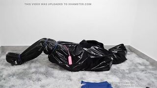 NANA Bodysuit and pvc sleepingsack bondage