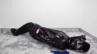 NANA Bodysuit and pvc sleepingsack bondage