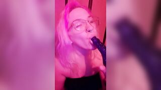 Sweet Nerdy Girl Grips Dildo With Split Tongue