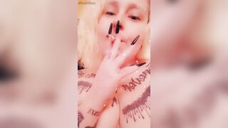 Blonde smokes naked