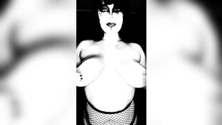 Goth vampire with huge swinging tits