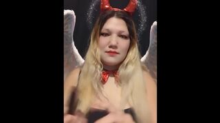 Angel of hell. Halloween costume. Cute girls smoke with me