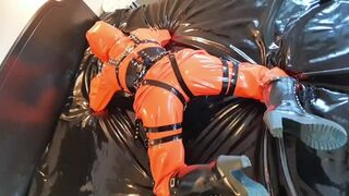 OnlyFans teaser - Heavyrubber latex lady in rainwear and harness!